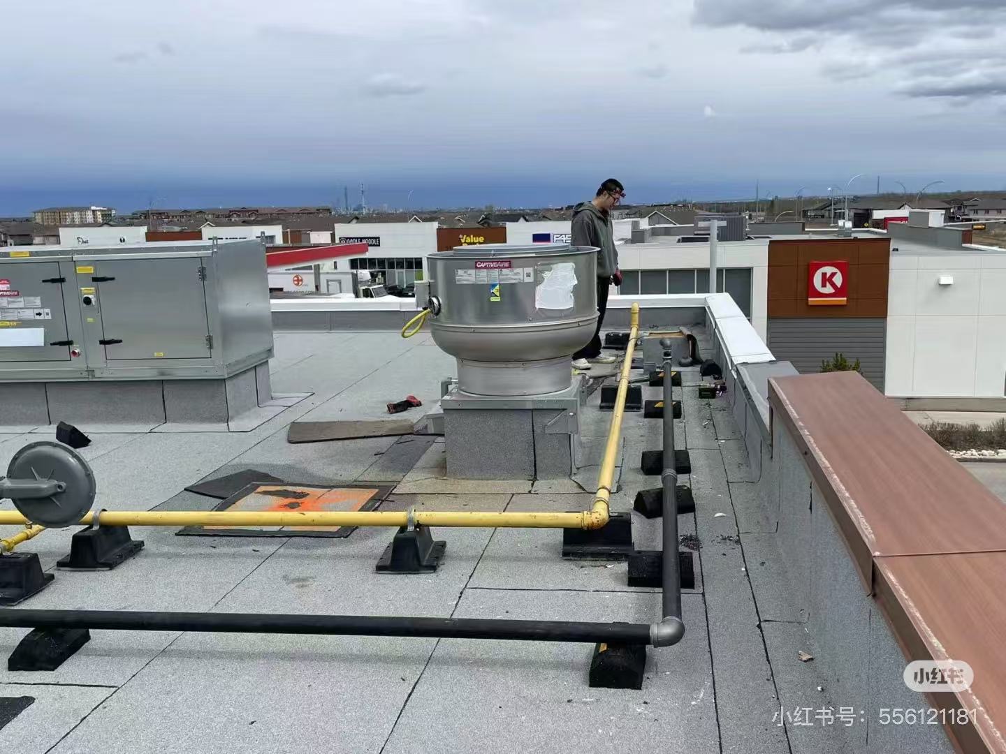 Rooftop HVAC and exhaust installation with safe, efficient gas line setup